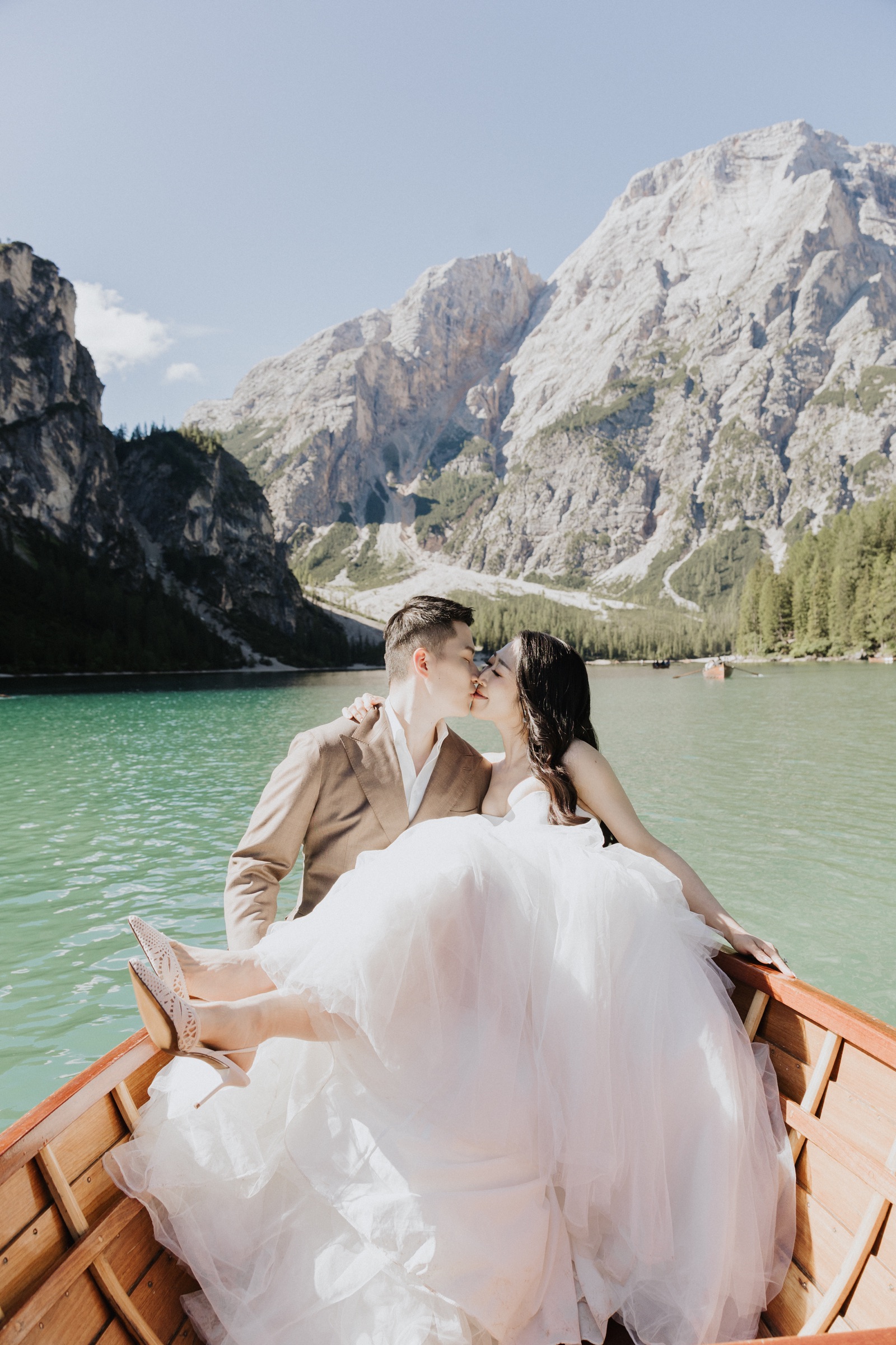 Cathleen and Justin together in a boat on an alpine lake
